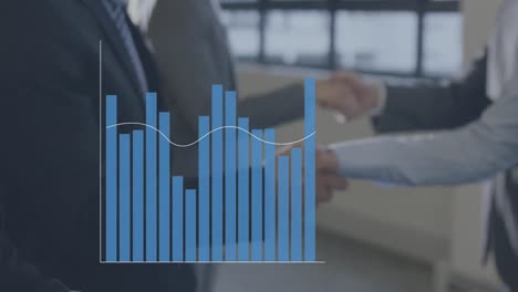 statistical data processing against mid section of businesspeople shaking hands at office