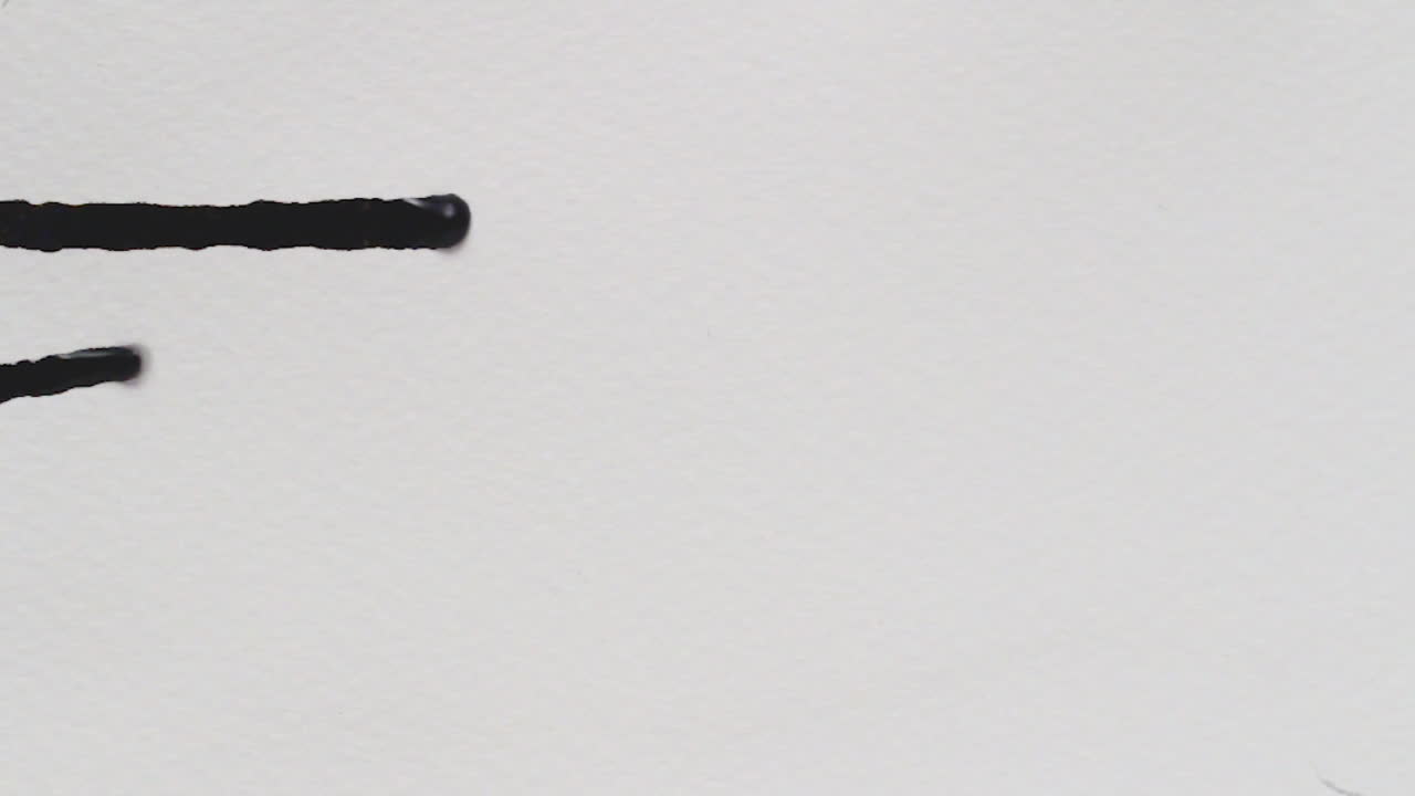 Top shot, macro shot, and close ups of various black ink lines flowing and seeping on textured white creative paper