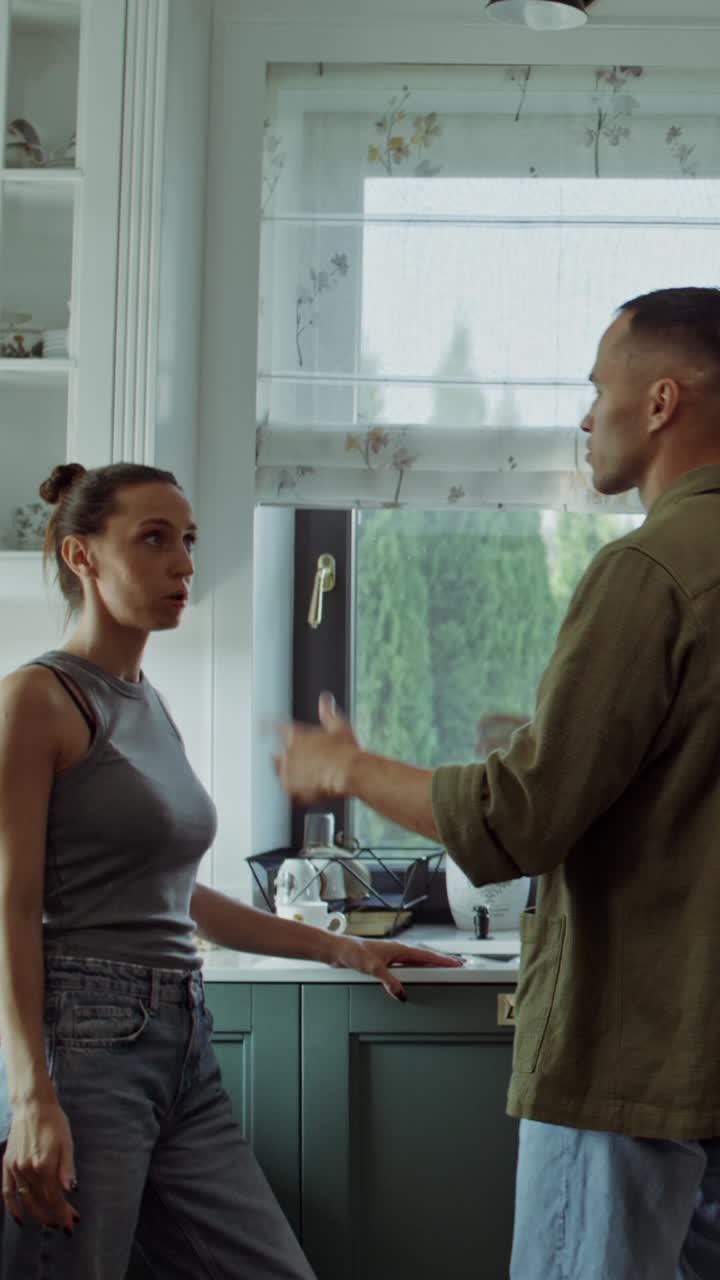 Couple Arguing in Kitchen