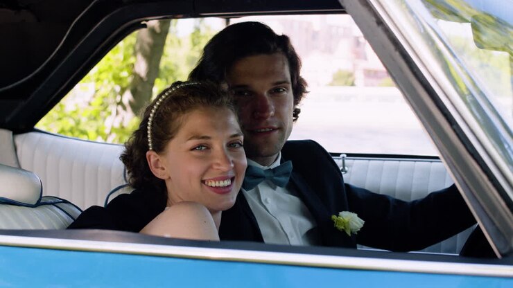 Just married couple in a car