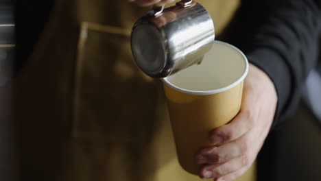 barista making coffee
