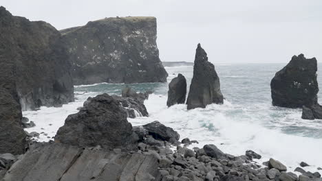 Waves-breaking-on-cliffs-at-rocky-coastline-of-Iceland