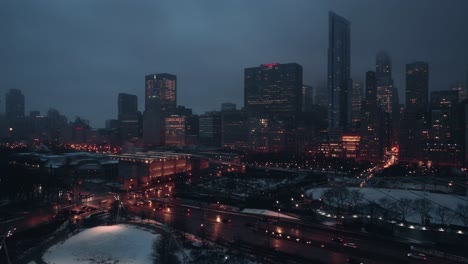 chicago aerial of a cityscape shows a well-lit metropolis with a lot of tall buildings and streetlights