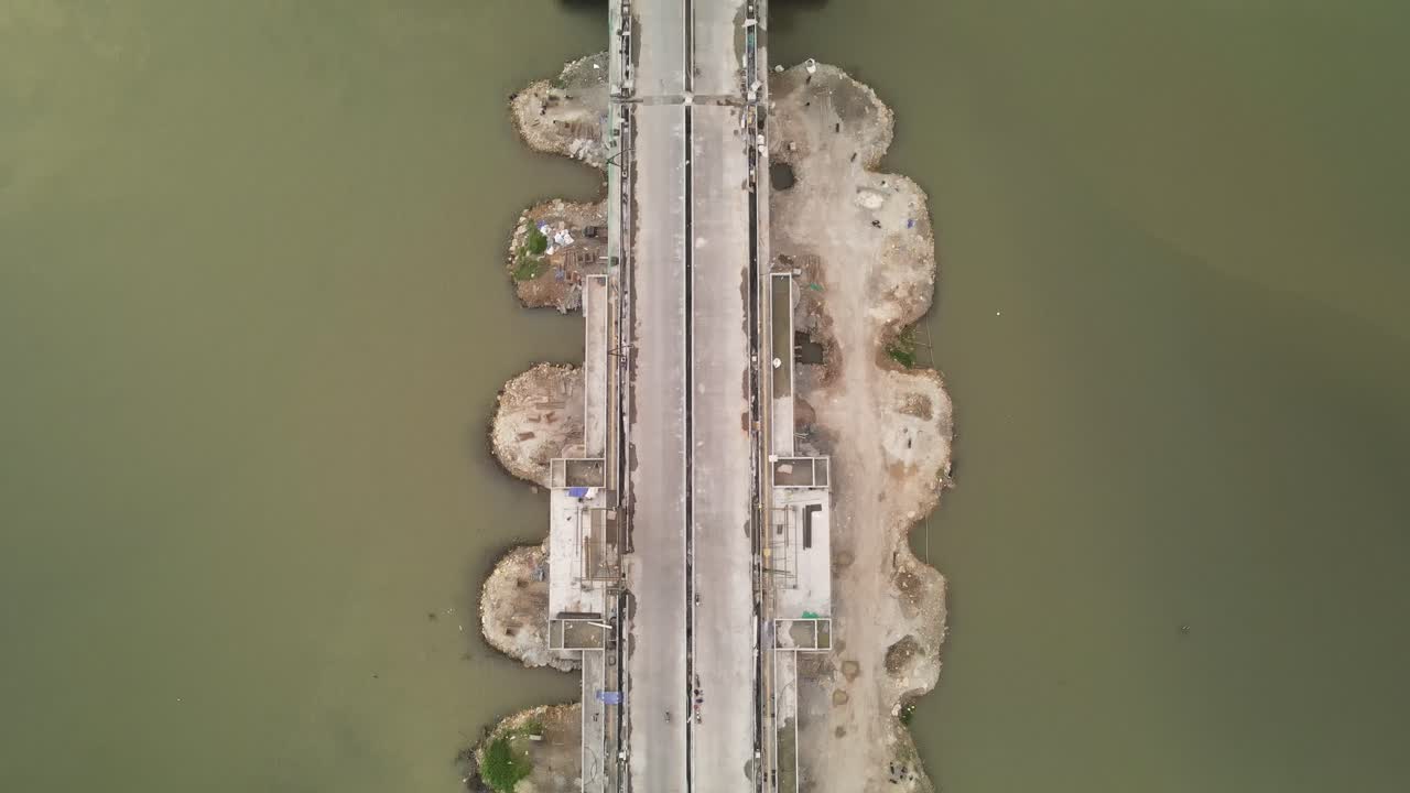 Aerial view of Pandansimo Bridge in Yogyakarta, the southern Java cross bridge is under construction. Adjacent to Baru Beach.