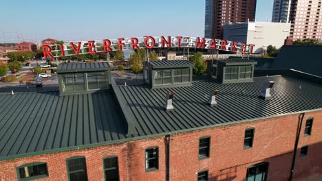 wilmington delaware city drone shot of riverfront market sunny day golden hour rising shot