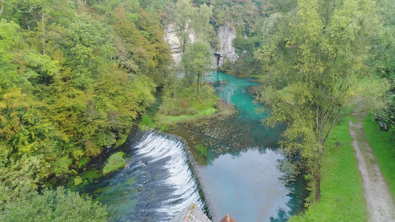 Aerial Drone Shot of Karst Spring at the Source of the Krupa River. Semic, Slovenia