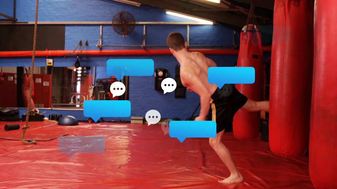 Man practicing martial arts in gym with chat bubble animation overlay