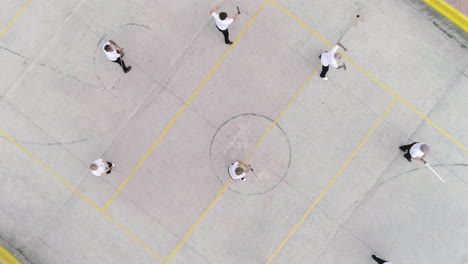 Toma-Aérea-De-Personas-Mayores-Practicando-Tai-Chi