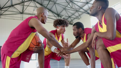 basketball players strategize during a timeout