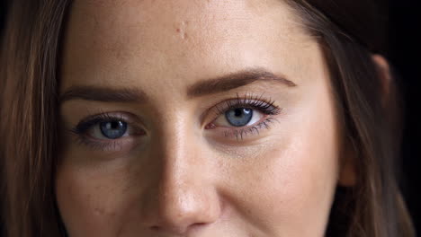 Close-Up-Of-Attractive-Young-Woman-Smiling-Into-Camera