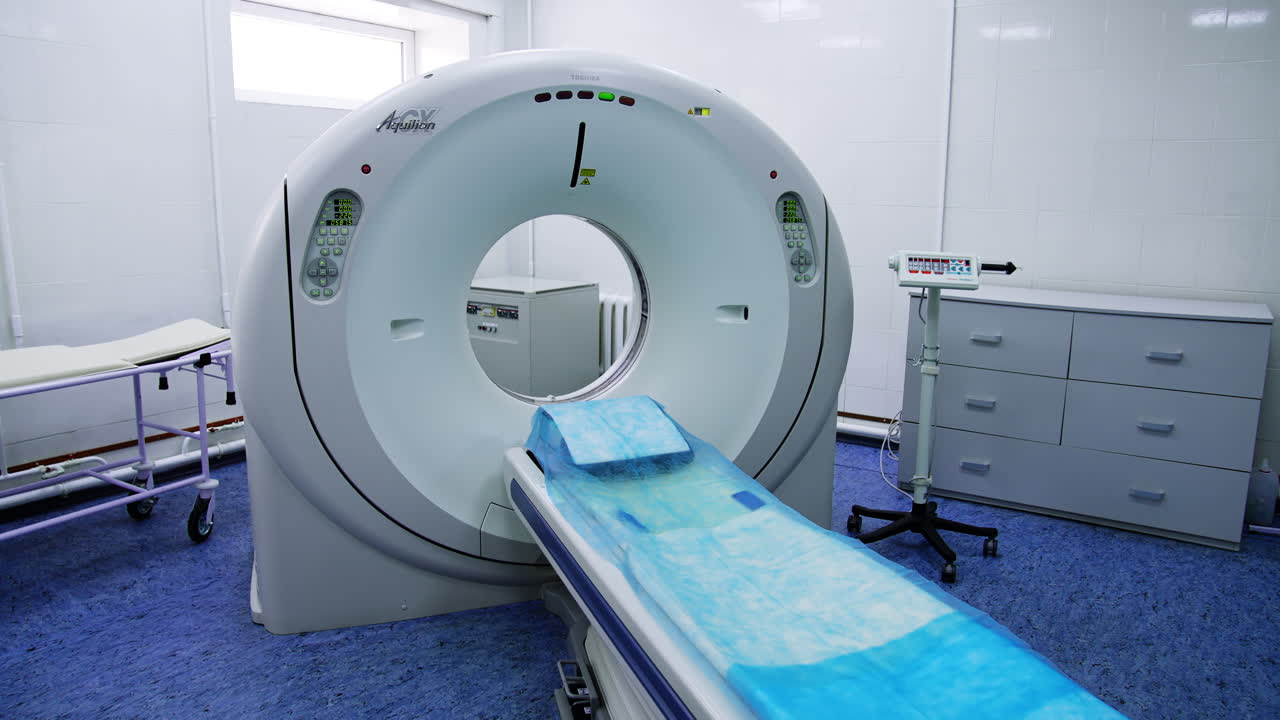 Toshiba magnetic resonance machine. Empty room for tomography research in the hospital.