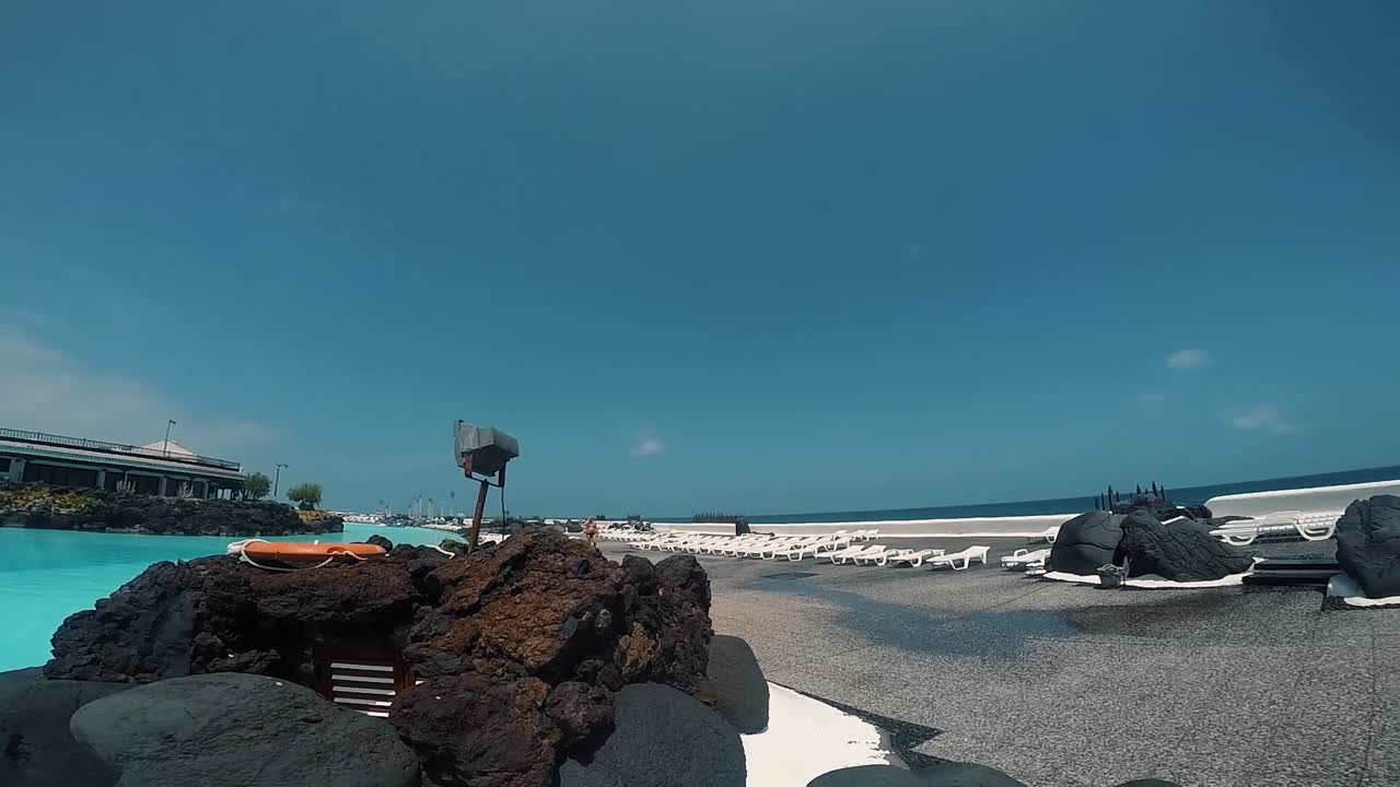 Artificial beach with turquoise water and hotels