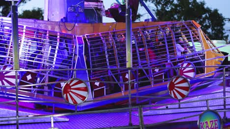 rotating amusement ride with vibrant lights