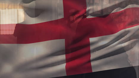 Animation-of-flag-of-england-over-caucasian-male-soldiers-holding-weapons