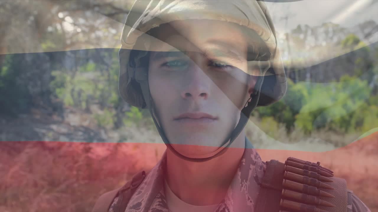 Soldier blinking while camera lifting revealing helmet, bandolier, tricolor overlay for military ID