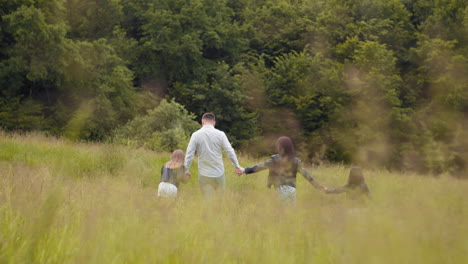 family hiking in a forest