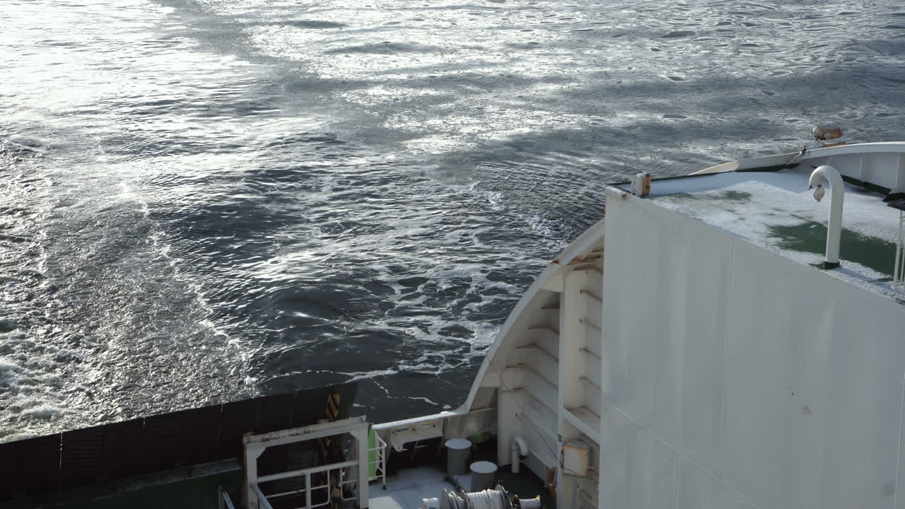 View of a ship's wake from the stern on the water