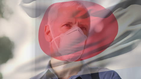 도시 거리에서 얼굴 마스크를 쓴 백인 남자가 일본의 국기를 흔들고 있는 애니메이션