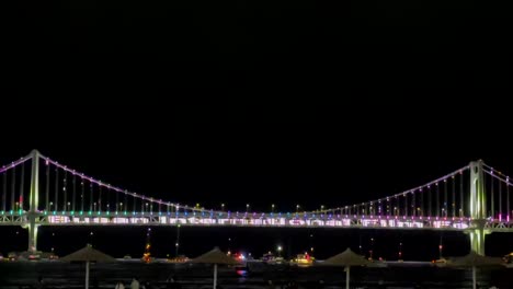 busan travel, vacation, nightlife attractions. gwangan bridge in gwangalli beach welcomes visitors to the 29th busan international film festival.