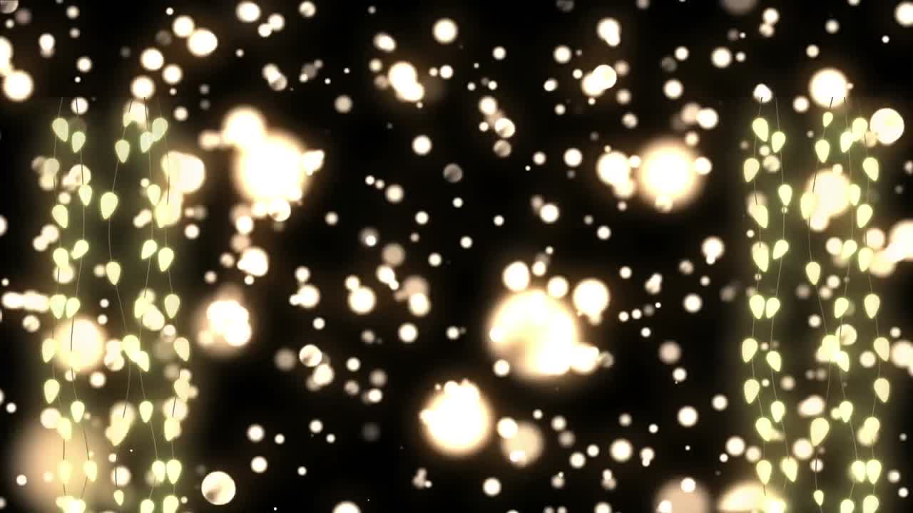 검은 바탕 위에 빛나는 크리스마스 요정 불빛의 애니메이션