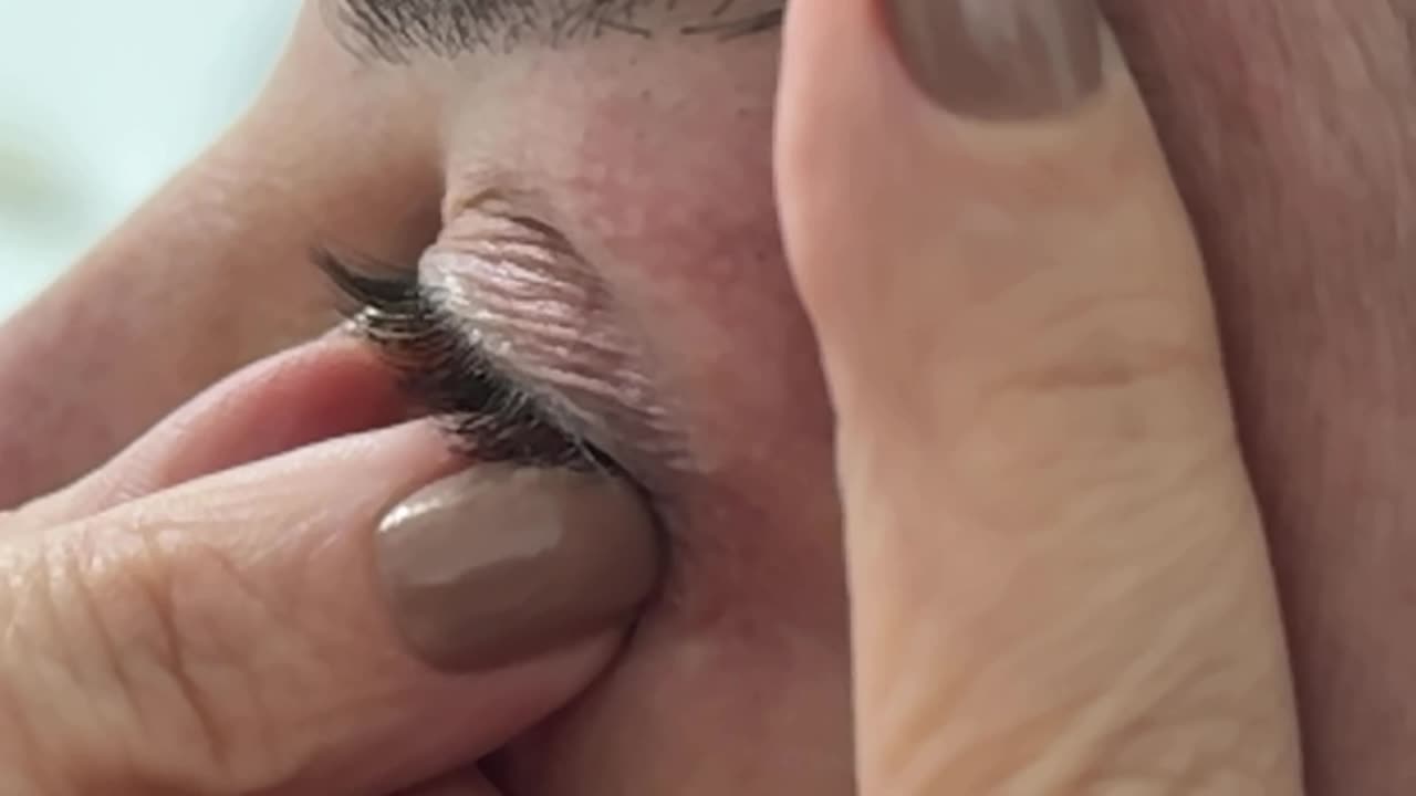 Close-up slow motion view, eyesight enhancements, contact lens removal