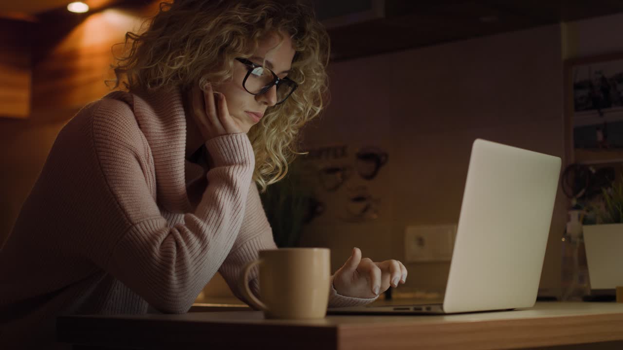 Bottom view of woman spending time in front of laptop