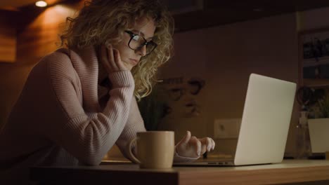 bottom view of woman spending time in front of laptop