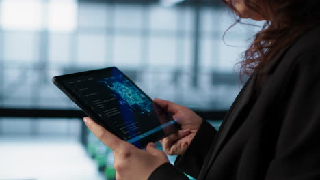 engineer in data center with tablet integrating ai driven automation tools