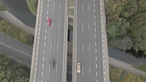 aerial top view of vehicles driving at m50 motorway in dublin city, ireland