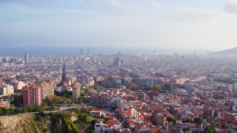 sweeping panoramic view of the city of barcelona seen from bunkers del carmen