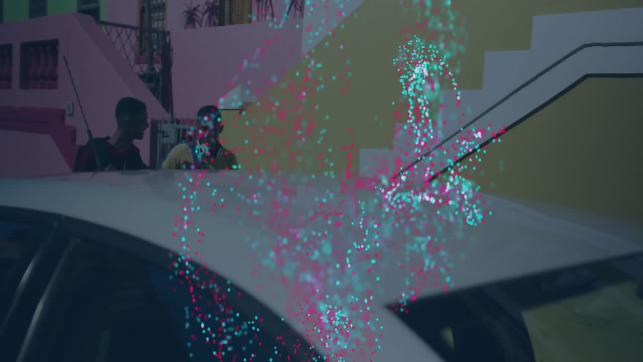 Colorful particles floating around people standing by white car outdoors