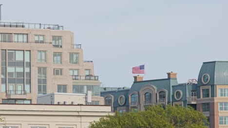 waving american and united states flag seen in washington dc