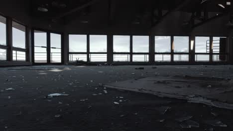 line of broken windows in an abandoned lodge