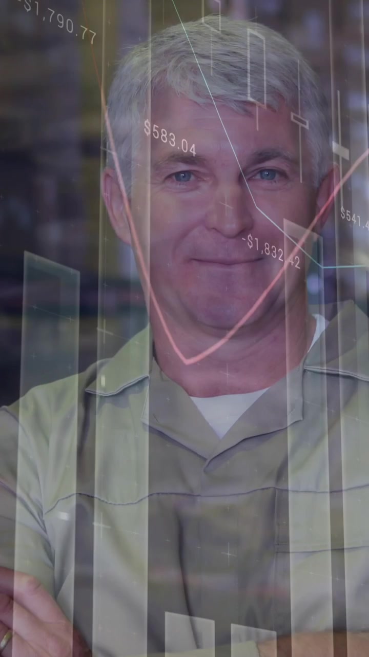 Animation of statistical data processing over caucasian senior male worker smiling at warehouse