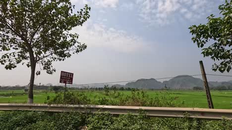 lush green fields and distant mountains