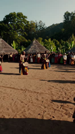 african tribal celebration with drumming and dancing