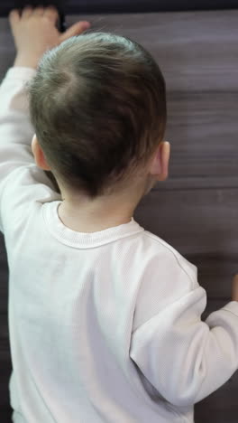 baby reaching for something