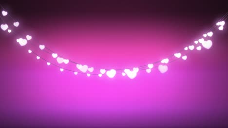 Glowing-string-of-fairy-lights-on-pink-background