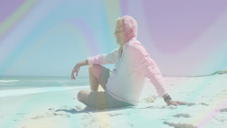 senior man leaning back on sand, displaying animated health chart and heart icon
