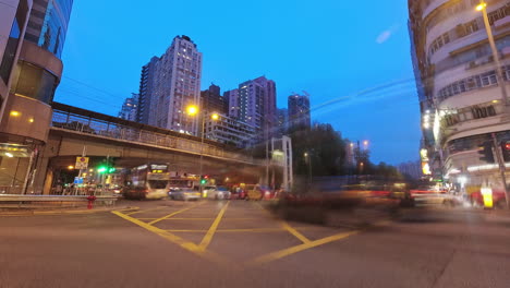 timelapse of day turning into night in mong kok road in hong kong