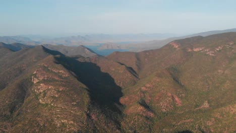 Ocean-in-the-middle-of-the-mountains-with-drone