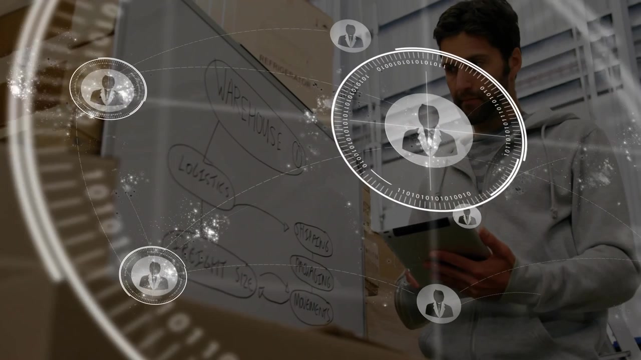 logistics lead tapping tablet at whiteboard generating HUD network with user icons for monitoring