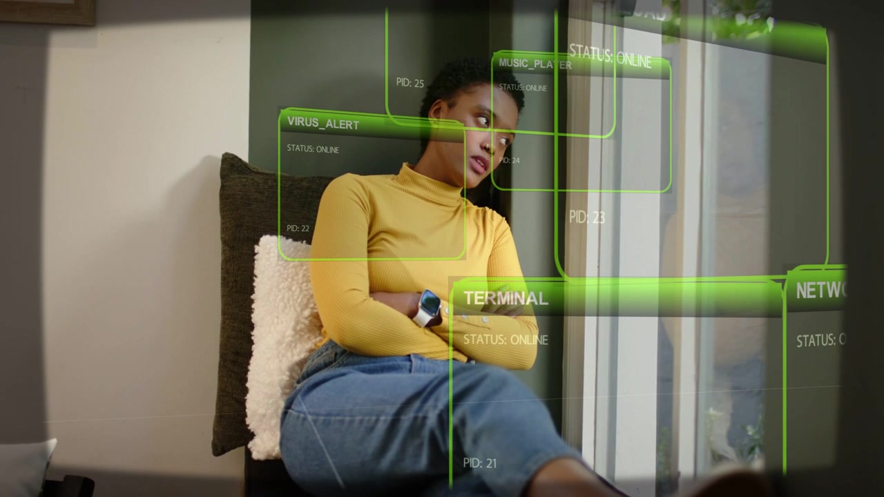 Woman in yellow top by window watching HUD overlays growing from network alerts as tracking status