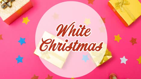 Animation-of-white-christmas-text-over-christmas-decorations-on-pink-background