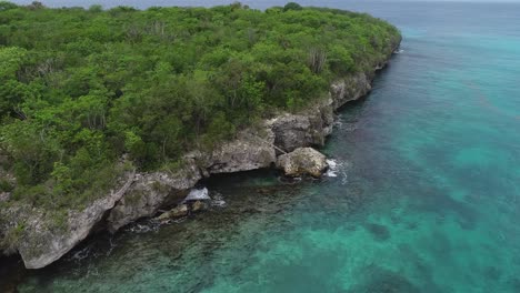 Aerial-forward-panoramic-view-of-Catalina-Island-in-Dominican-Republic