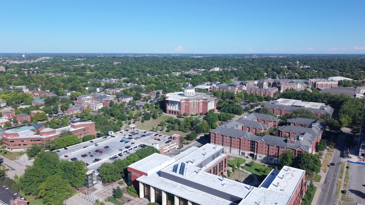The William T. Young Library, known as the 'Willy T.' neighborhood, and campus at the University of Kentucky in Lexington - forward aerial view