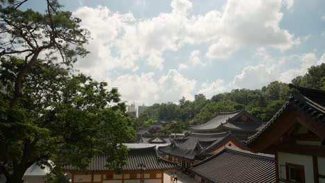 high angle view of bongeunsa buddhist temple against white clouds in seoul, south korea