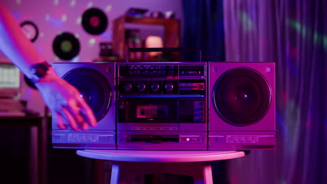 vintage boombox in neon lighting