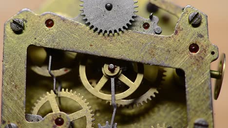 exploring intricate mechanisms: a close-up view of vintage clock gears showcasing the elegance of timekeeping engineering and craftsmanship