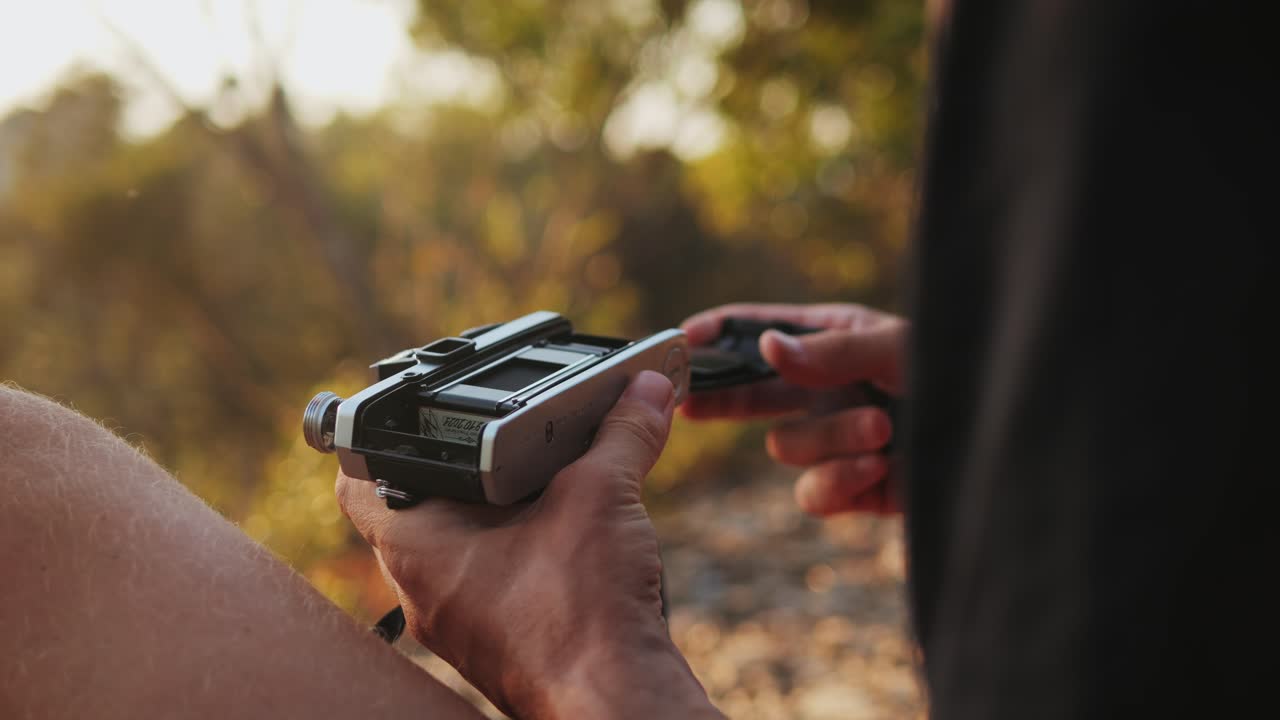 Loading Film in a Vintage Camera Outdoors